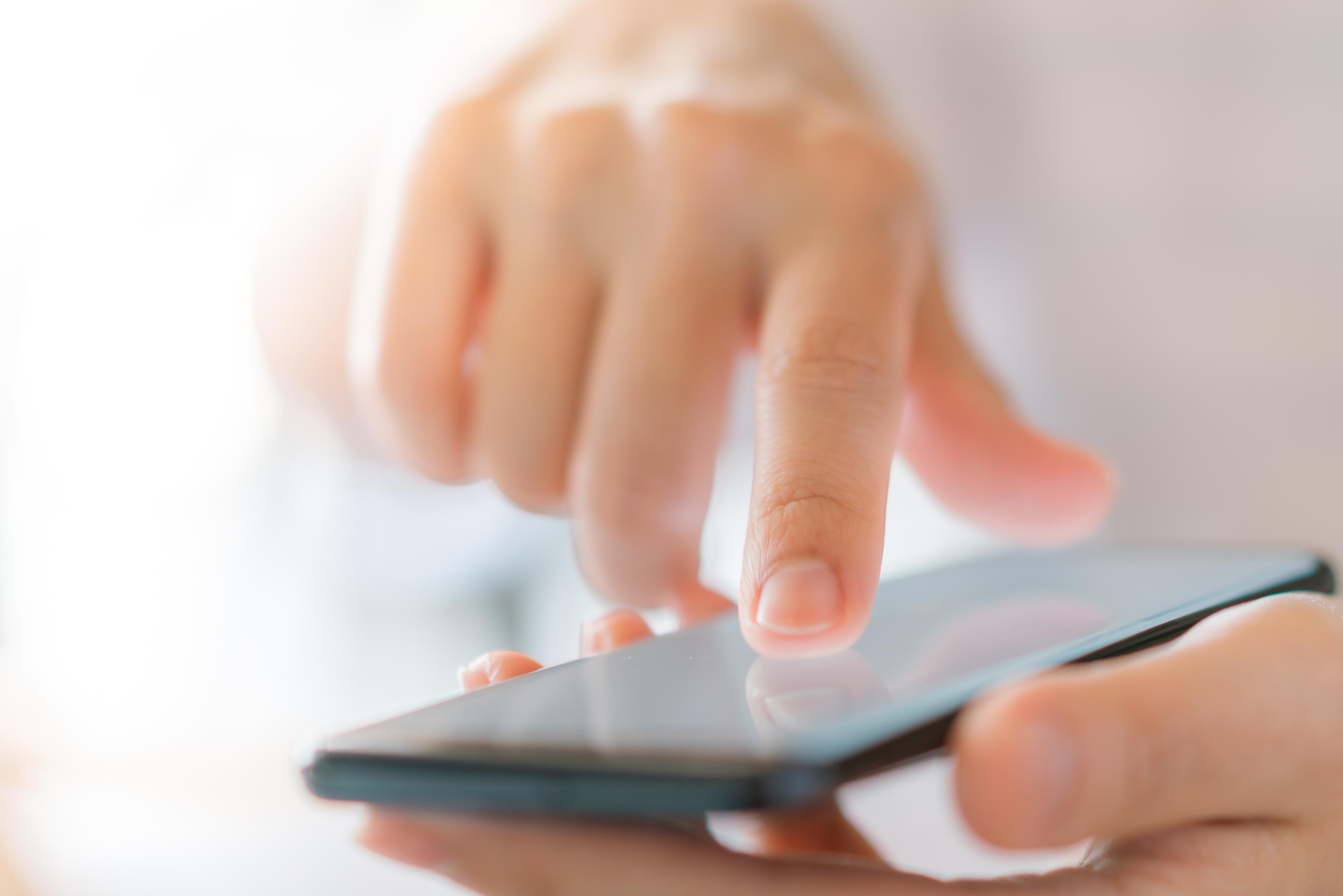 Hand using smartphone